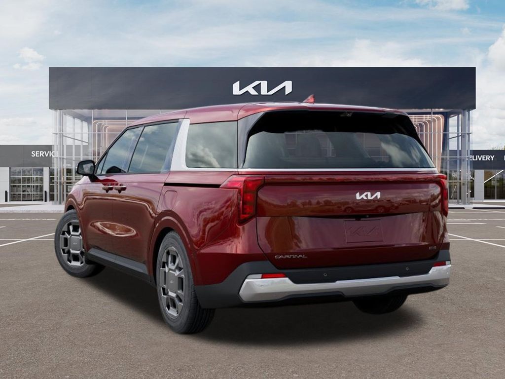 2026 Kia Carnival Hybrid EX AUTO Red at Joe Myers Mazda Kia