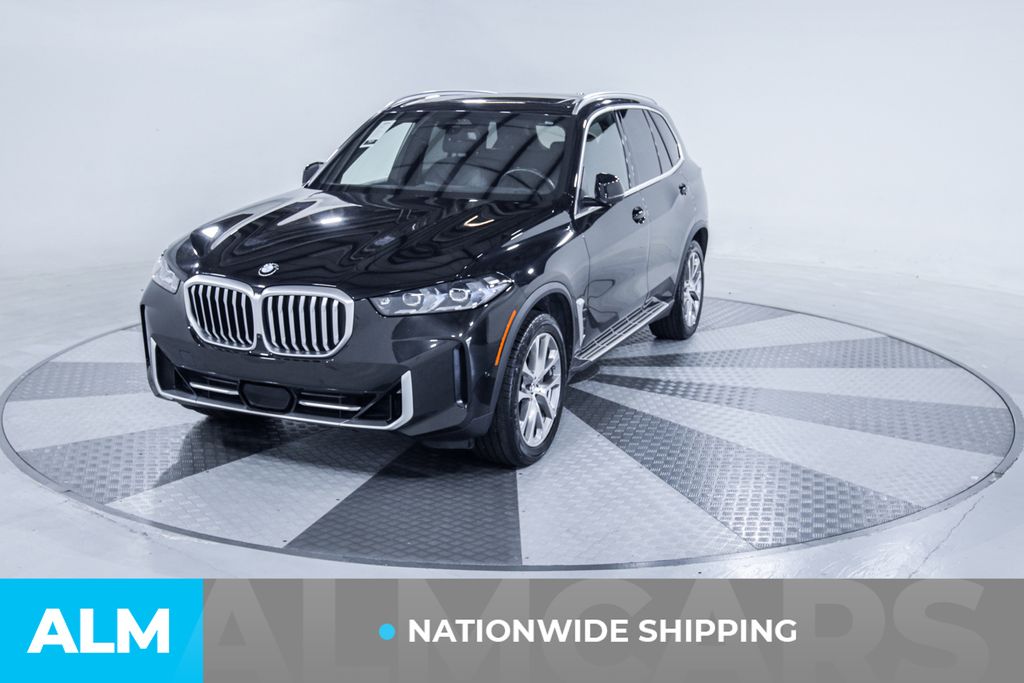 Used 2024 Black BMW sDrive40i image 2