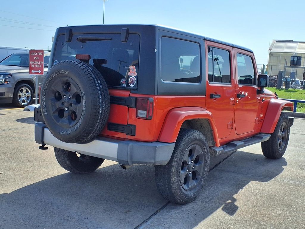 2015 Jeep Wrangler Unlimited Sahara Orange at Emmons Autoplex