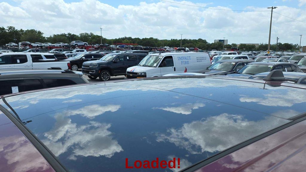 2025 Delmonico Red Pearlcoat Ram 1500 Rebel 4X4 Truck