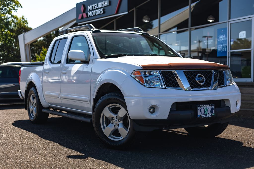Avalanche 2006 Nissan Frontier LE 4dr Crew Cab 4WD SB Pickup Truck Four-Wheel Drive 5-Speed Automatic Overdrive