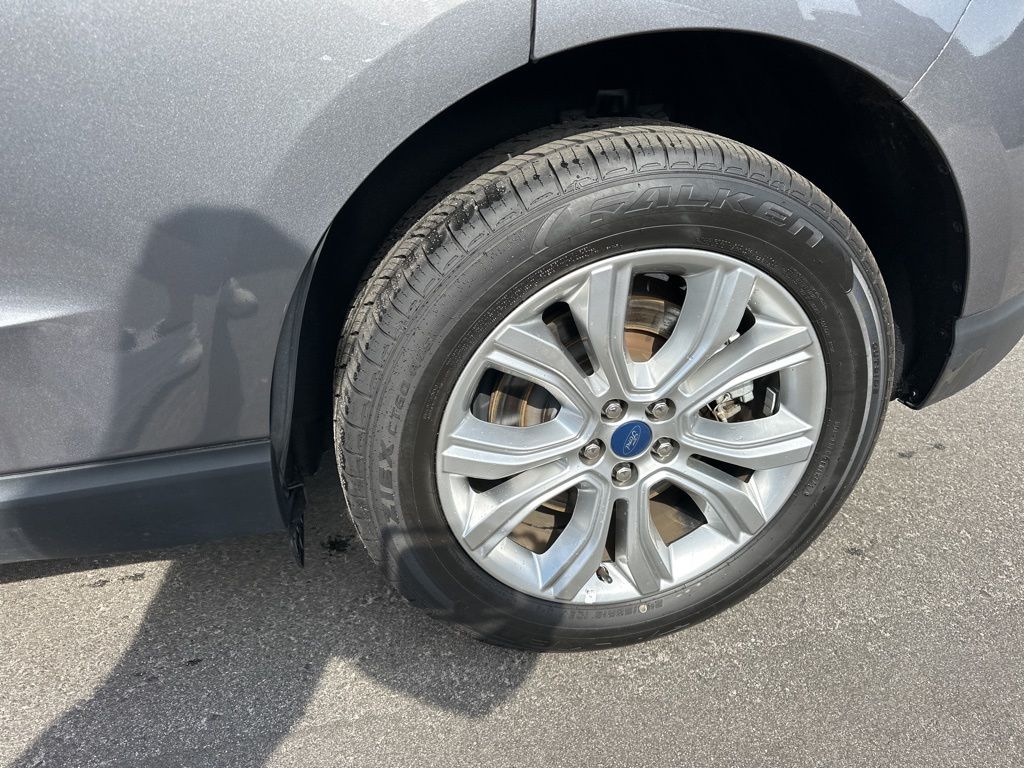 2022 Carbonized Gray Metallic Ford Edge Titanium AWD SUV