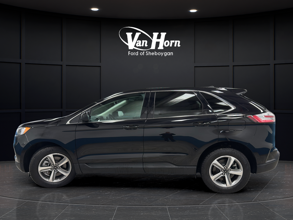 Used 2024 Agate Black Metallic Ford SEL image 4