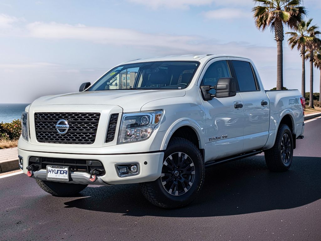 Pearl White Metallic 2019 Nissan Titan Pickup Truck Four-Wheel Drive 7-Speed Automatic