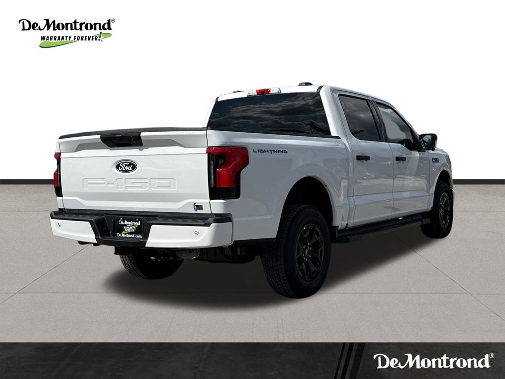 2025 Ford F-150 Lightning XLT White at DeMontrond Ford