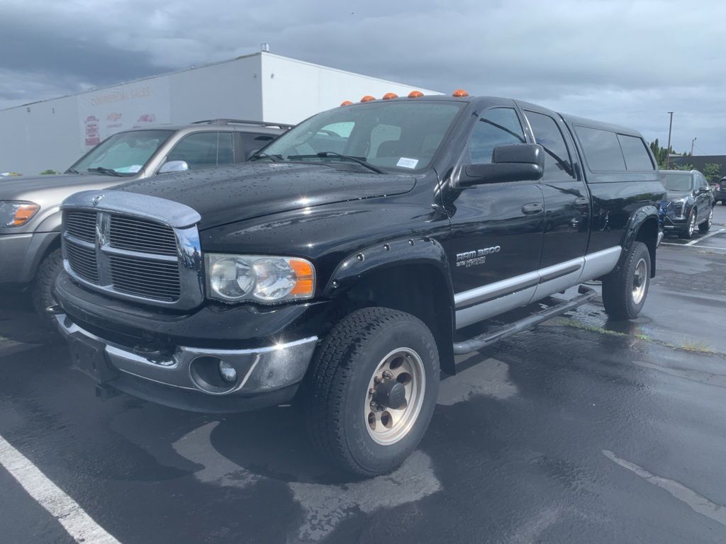 Black 2005 Dodge RAM 3500 SLT Quad Cab 4WD Pickup Truck Four-Wheel Drive 4-Speed Automatic