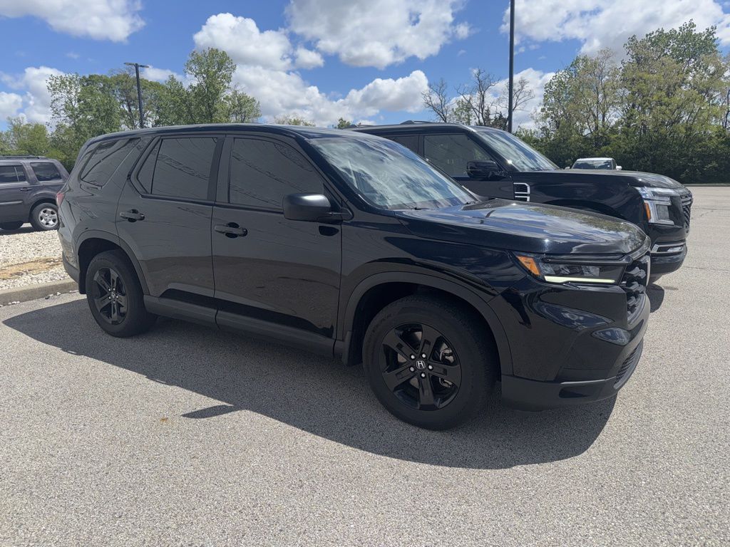 View vehicle photo 3