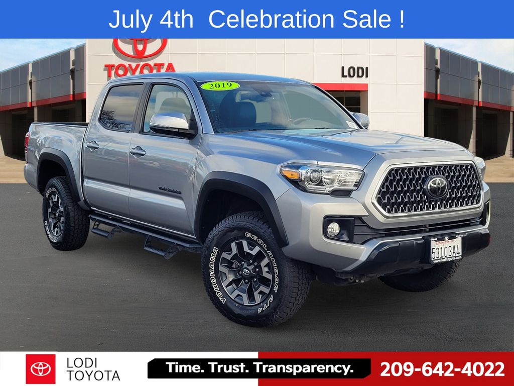 Silver Sky Metallic 2019 Toyota Tacoma Pickup Truck Four-Wheel Drive 6-Speed Manual