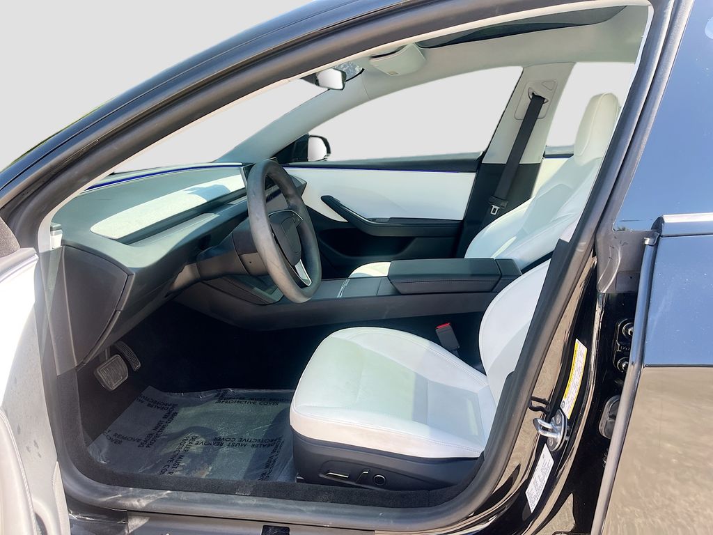 2025 Tesla Model 3 Long Range Black at AutoSavvy Houston Northwest