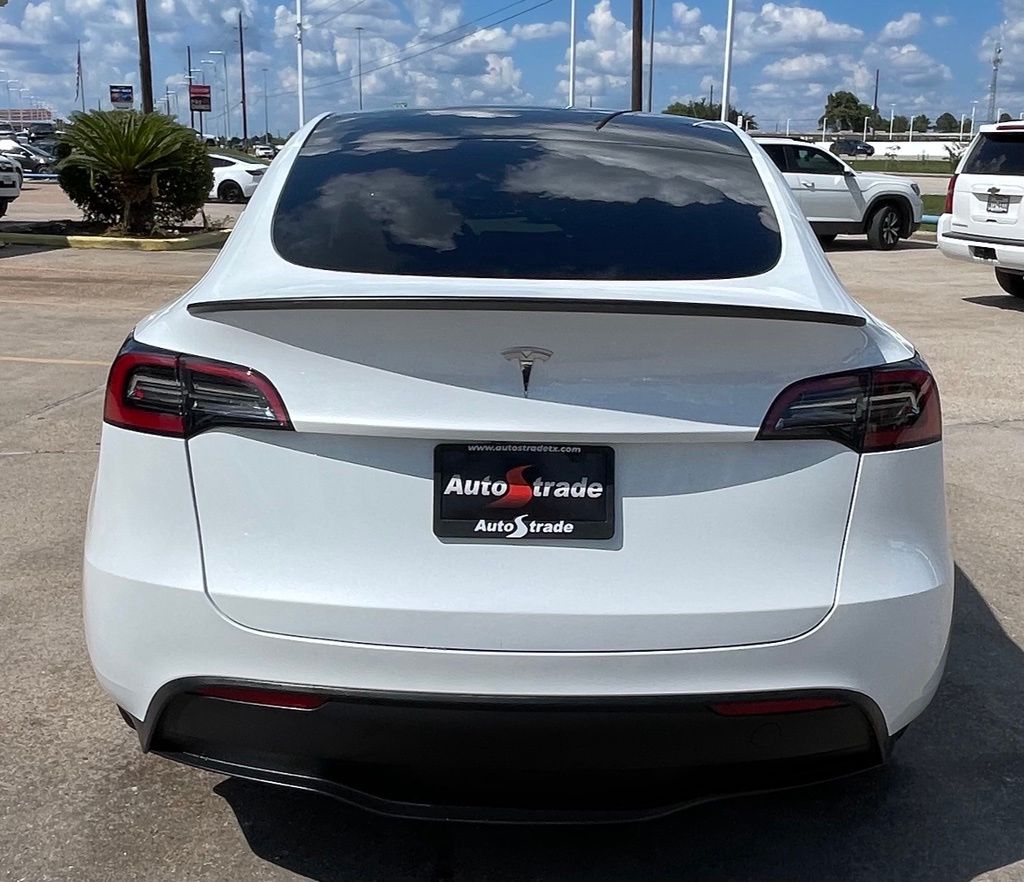2023 Tesla Model Y Long Range White at River Oaks CDJR