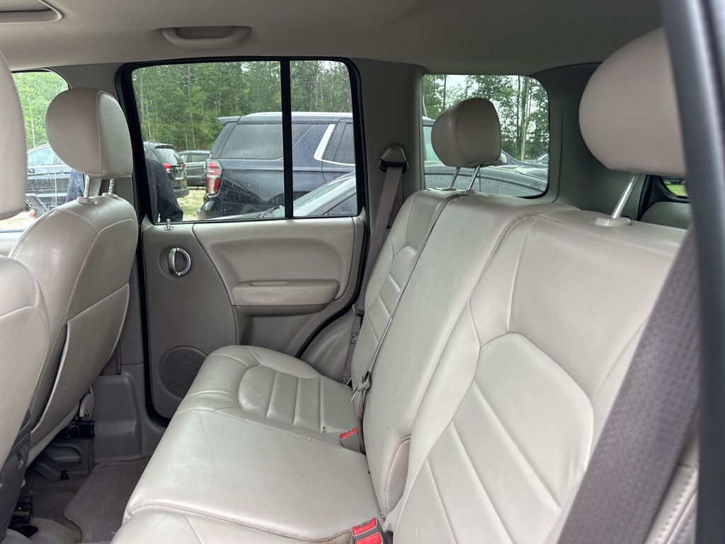 2004 Deep Molten Red Pearlcoat Jeep Liberty Limited RWD SUV