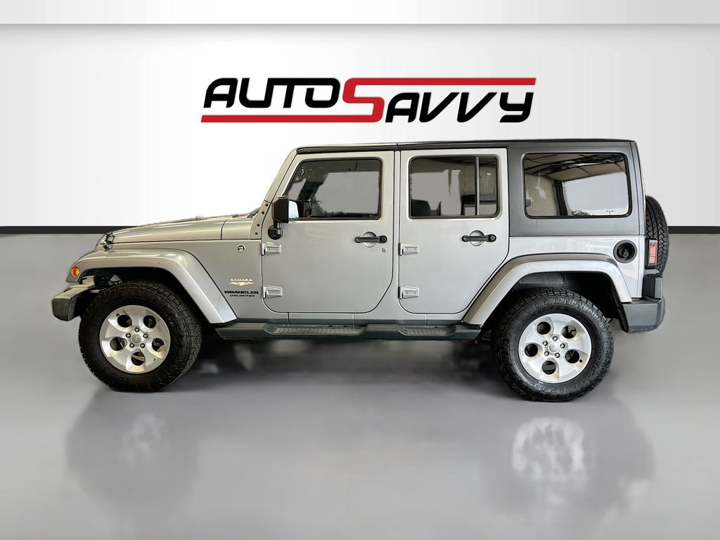 Used 2014 Billet Metallic Clearcoat Jeep Unlimited Sahara image 4