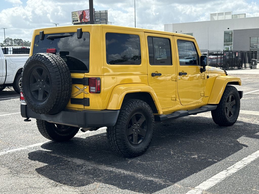 2015 Jeep Wrangler Unlimited Sahara Yellow at Parkway Family Mazda