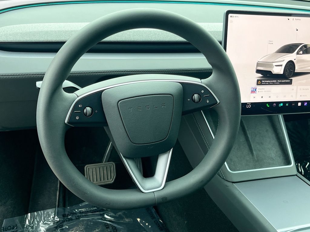 2026 Tesla Model Y Long Range White at AutoSavvy Houston Northwest