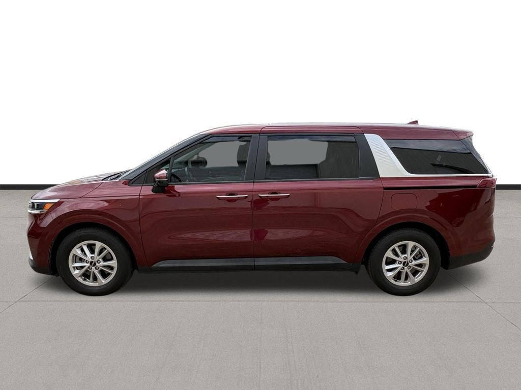 2024 Kia Carnival LX Red at Classic Chevrolet Galveston