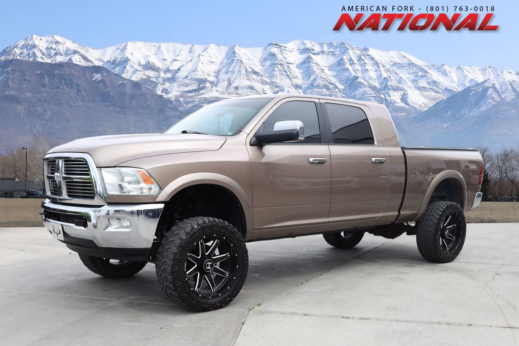 Brown (Tan Pearl) 2010 Dodge RAM 3500 Laramie Mega Cab 4WD Pickup Truck Four-Wheel Drive 6-Speed Automatic