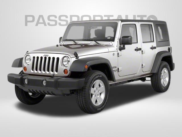 Black Clearcoat 2012 Jeep Wrangler Unlimited Sahara 4WD SUV / Crossover Four-Wheel Drive 5-Speed Automatic