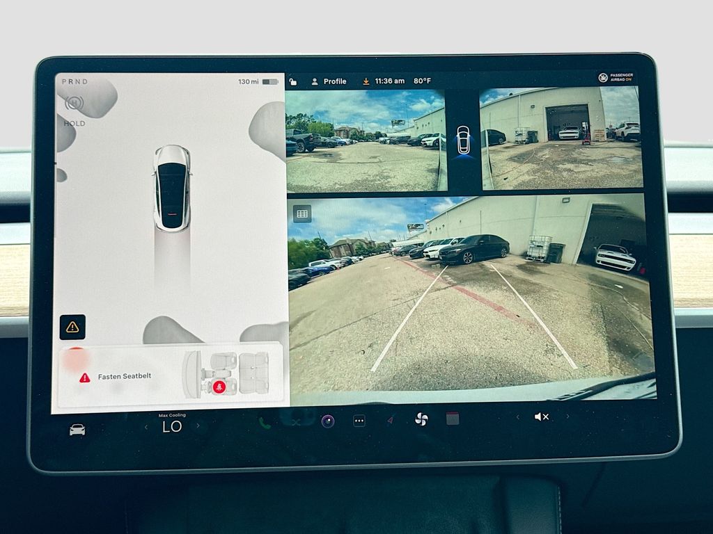 2024 Tesla Model Y Long Range White at AutoSavvy Houston Southwest