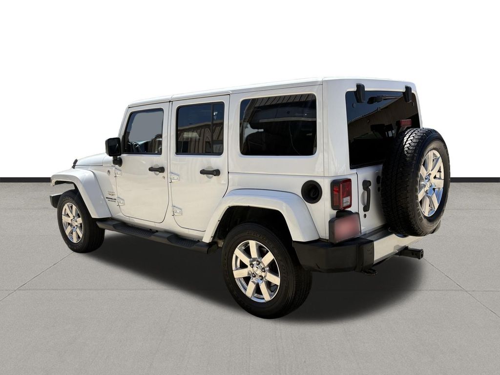 2014 Jeep Wrangler Unlimited Sahara White at Autostrade
