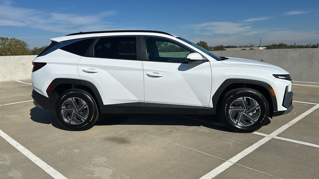 2025 Hyundai Tucson Hybrid Blue White at Baytown Hyundai