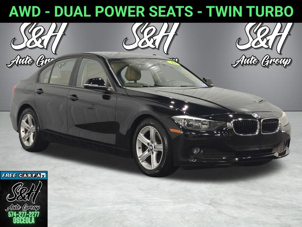 Jet Black 2013 BMW 3 Series Sedan All-Wheel Drive 8-Speed Automatic