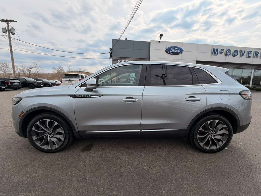 View vehicle photo 3