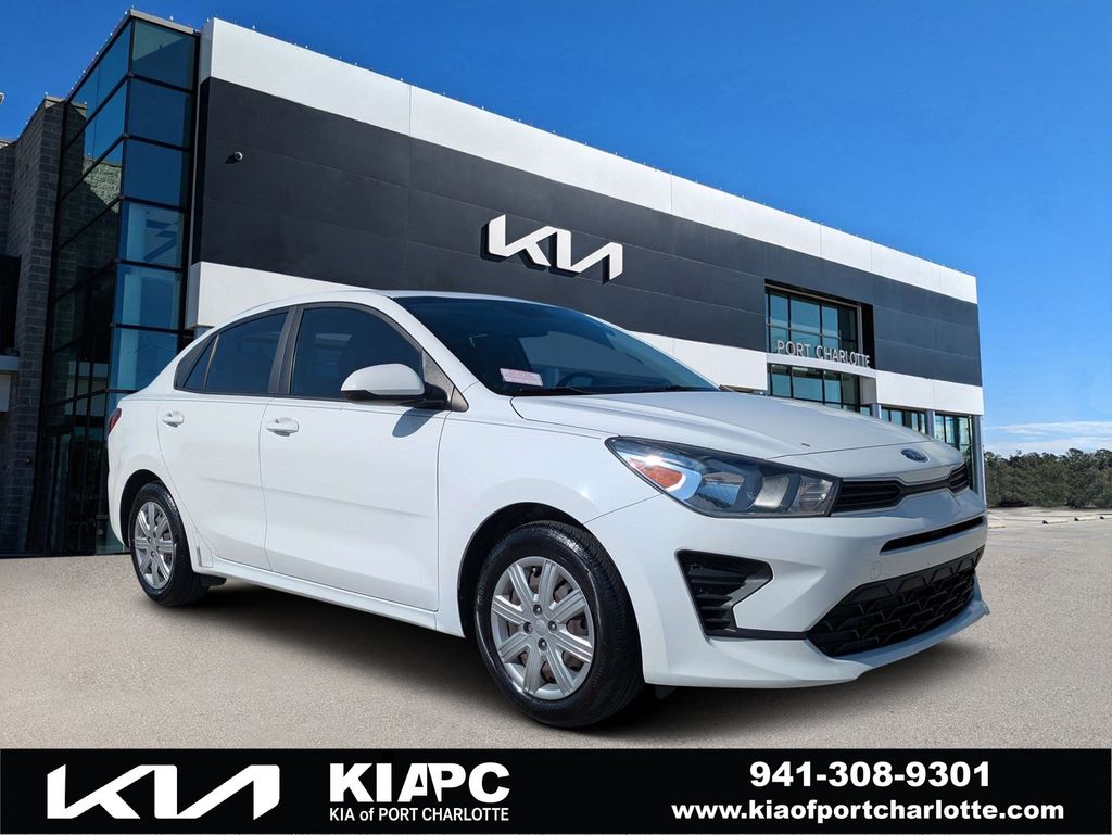 Clear White 2021 Kia Rio Sedan Front-Wheel Drive Continuously Variable Transmission