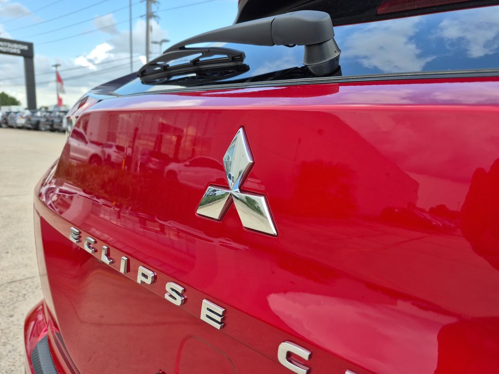 2025 Mitsubishi Eclipse Cross LE Red at DeMontrond Gulf Freeway