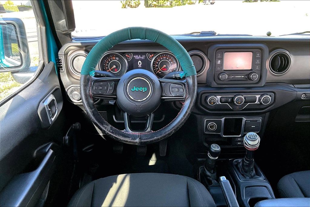 Used 2020 Teal Jeep Unlimited Sport image 5