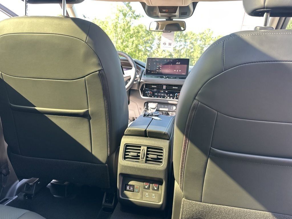 2025 Boulder Gray Pearl/Super Black Nissan Rogue Platinum FWD SUV