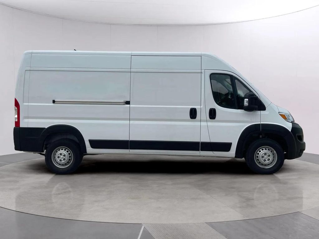 Used 2025 Bright White Clearcoat Ram High Roof image 6