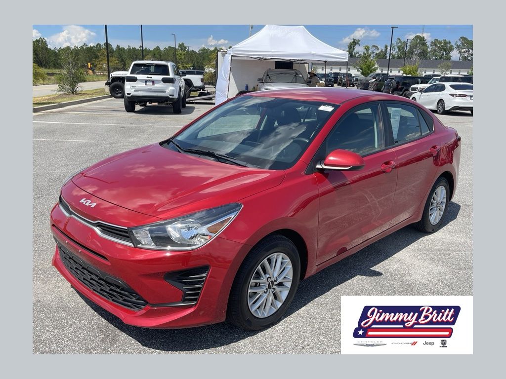 Red 2023 Kia Rio Sedan Front-Wheel Drive Continuously Variable Transmission