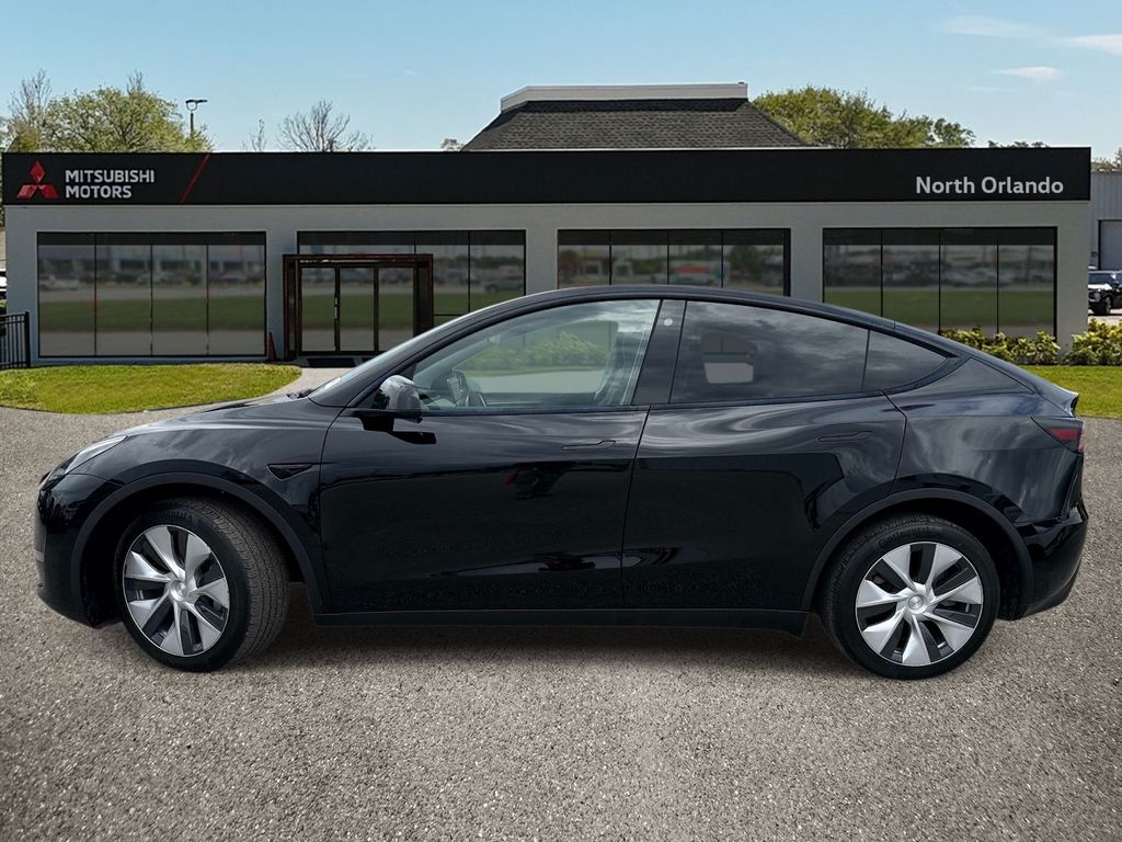 Used 2023 Tesla Model Y Long Range with VIN 7SAYGDEEXPF710368 for sale in Orlando, FL