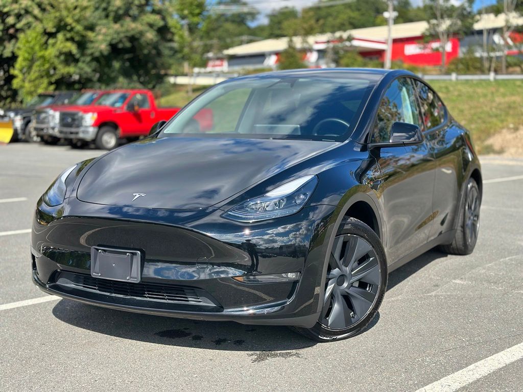 Solid Black 2025 Tesla Model Y SUV / Crossover All-Wheel Drive 1-Speed Automatic