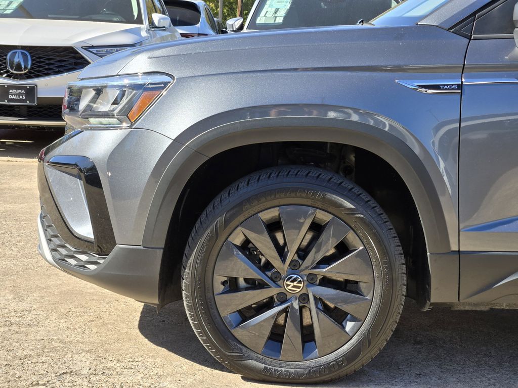 used 2023 Volkswagen Taos car, priced at $18,484