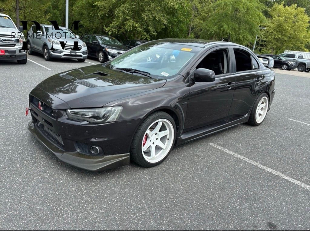 Black 2014 Mitsubishi Lancer Evolution Sedan All-Wheel Drive 5-Speed Manual