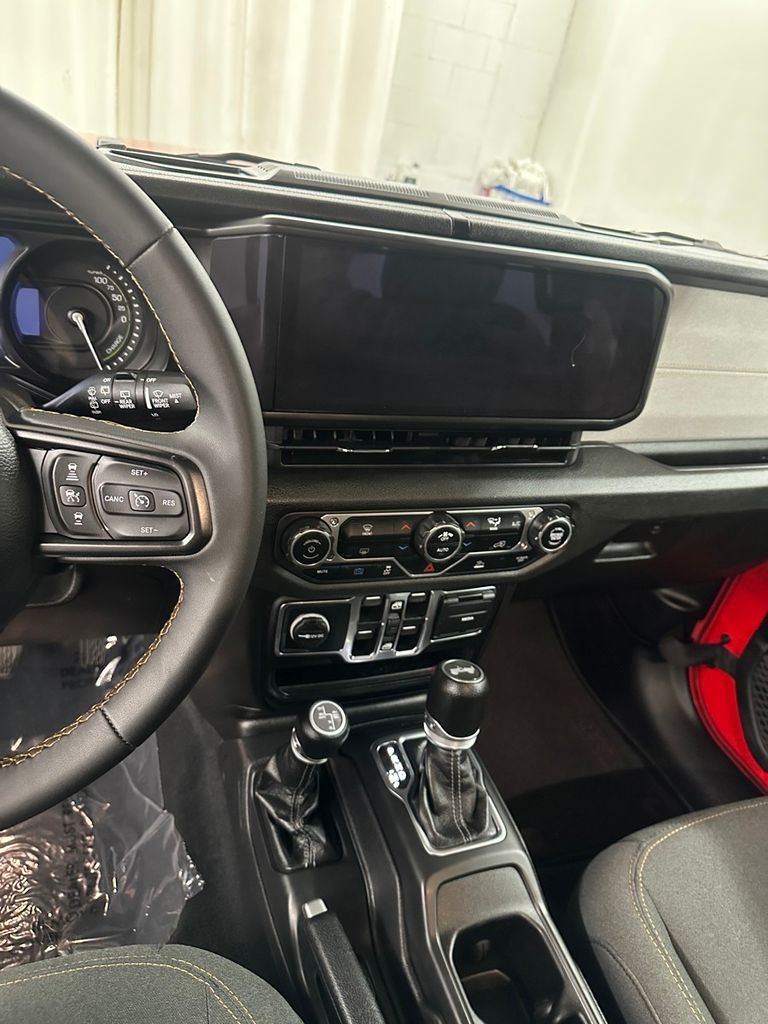 used 2024 Jeep Wrangler car, priced at $26,485