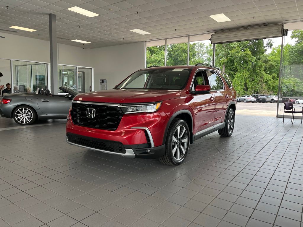 View vehicle photo 3