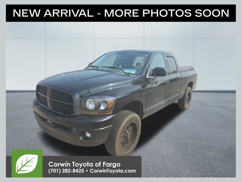 Black Clearcoat 2006 Dodge RAM 1500 Pickup Truck Four-Wheel Drive 5-Speed Automatic