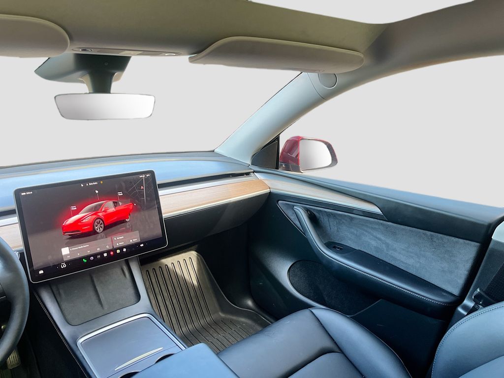 2025 Tesla Model Y Long Range Red at AutoSavvy Houston Northwest