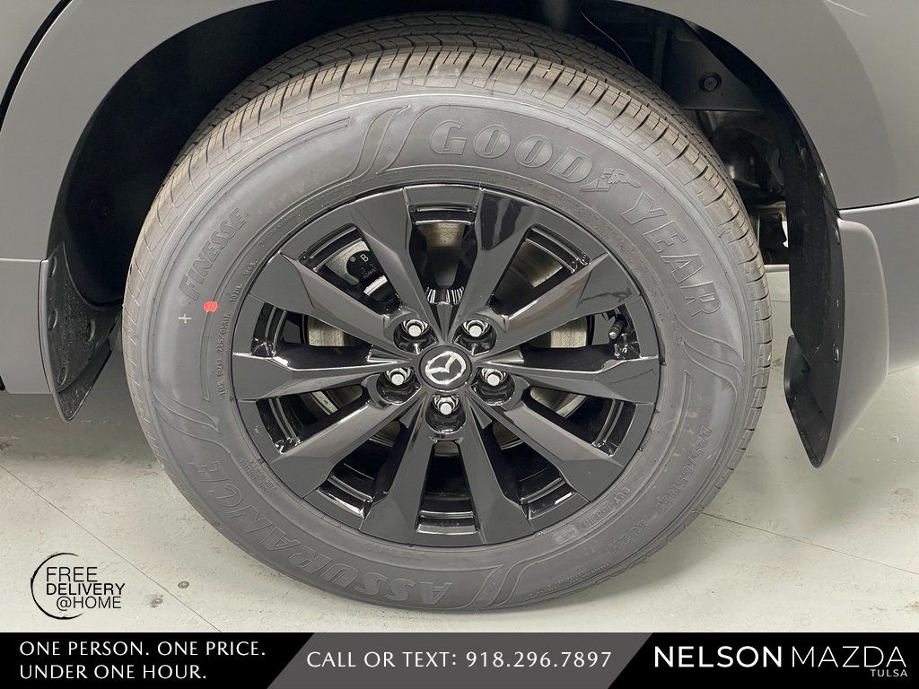 New 2026 Black Mazda Premium image 12