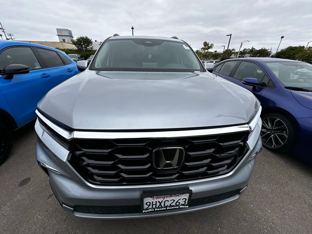 View vehicle photo 3