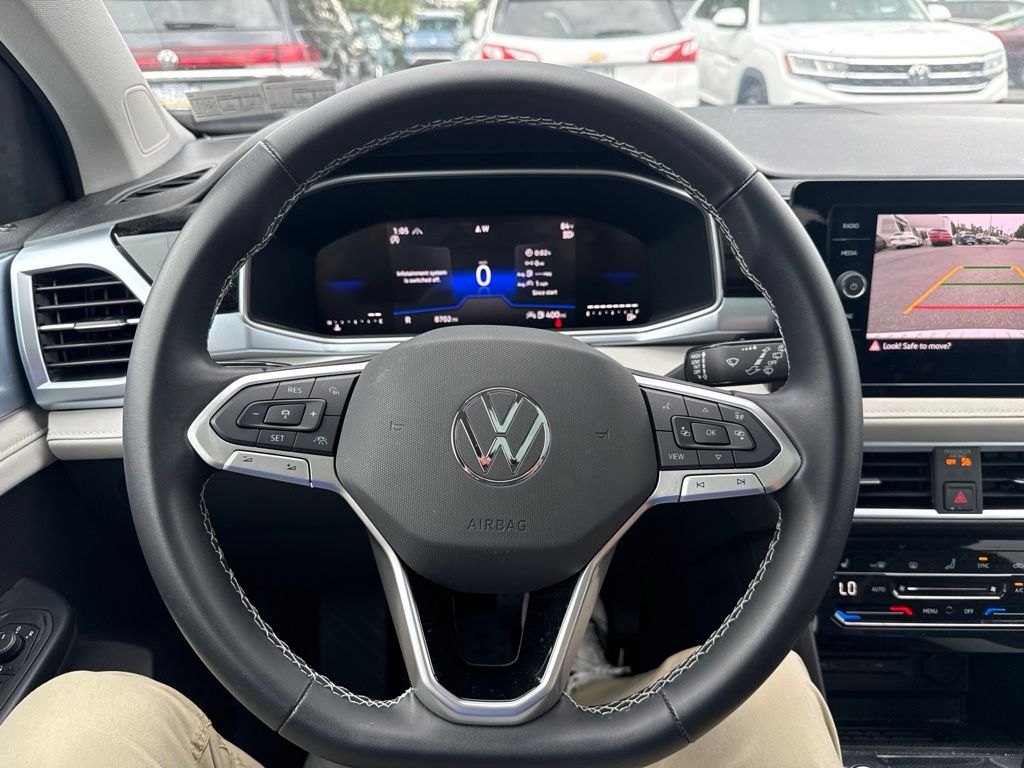 2025 Volkswagen Taos 1.5T SE Black at Sutliff Volkswagen