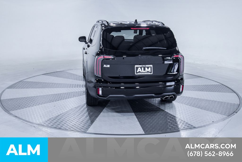 Used 2025 Black Kia EX X-Line image 8