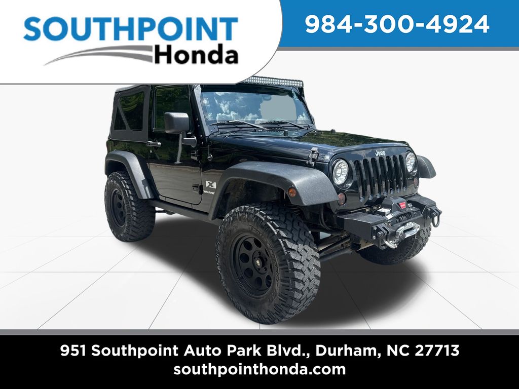 Black Clearcoat 2009 Jeep Wrangler SUV / Crossover Four-Wheel Drive 6-Speed Manual