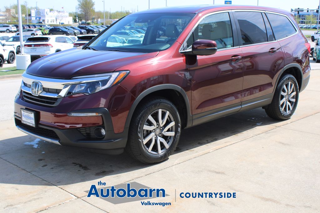 View vehicle photo 3
