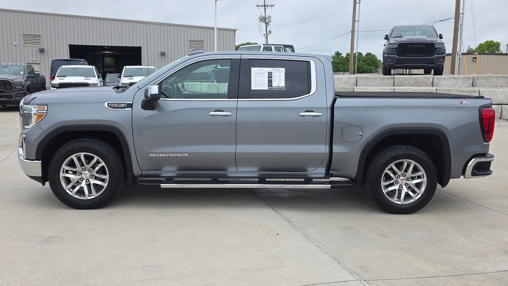 Used 2021 GMC Sierra 1500 SLT with VIN 1GTU9DEL5MZ222410 for sale in Kansas City