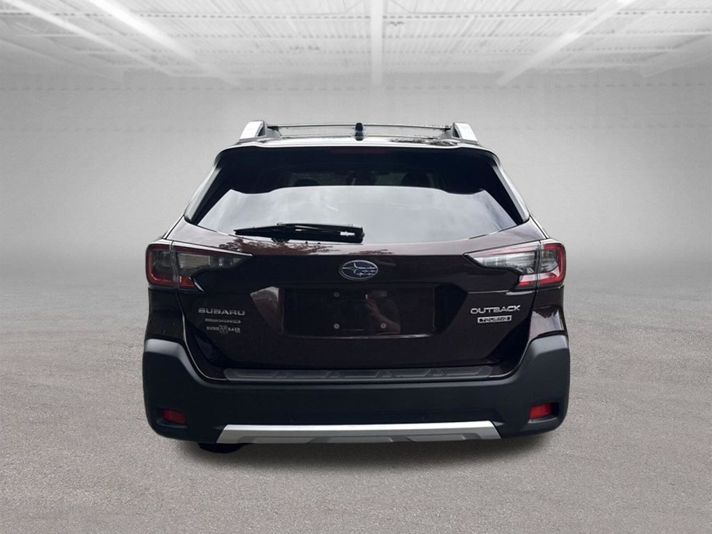 2025 Subaru Outback Touring Red at Rafferty Subaru