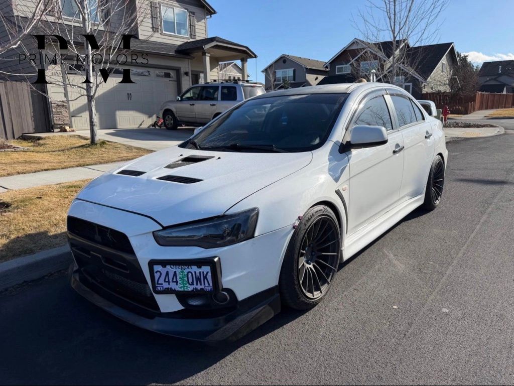 White 2014 Mitsubishi Lancer Evolution GSR Sedan All-Wheel Drive 5-Speed Manual