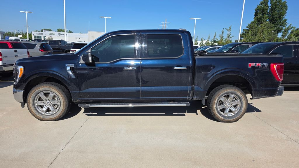 Used 2021 Ford F-150 XLT with VIN 1FTFW1E80MFA51692 for sale in Kansas City